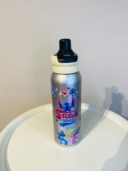Silver Disney Stitch "Gogogo" reusable water bottle